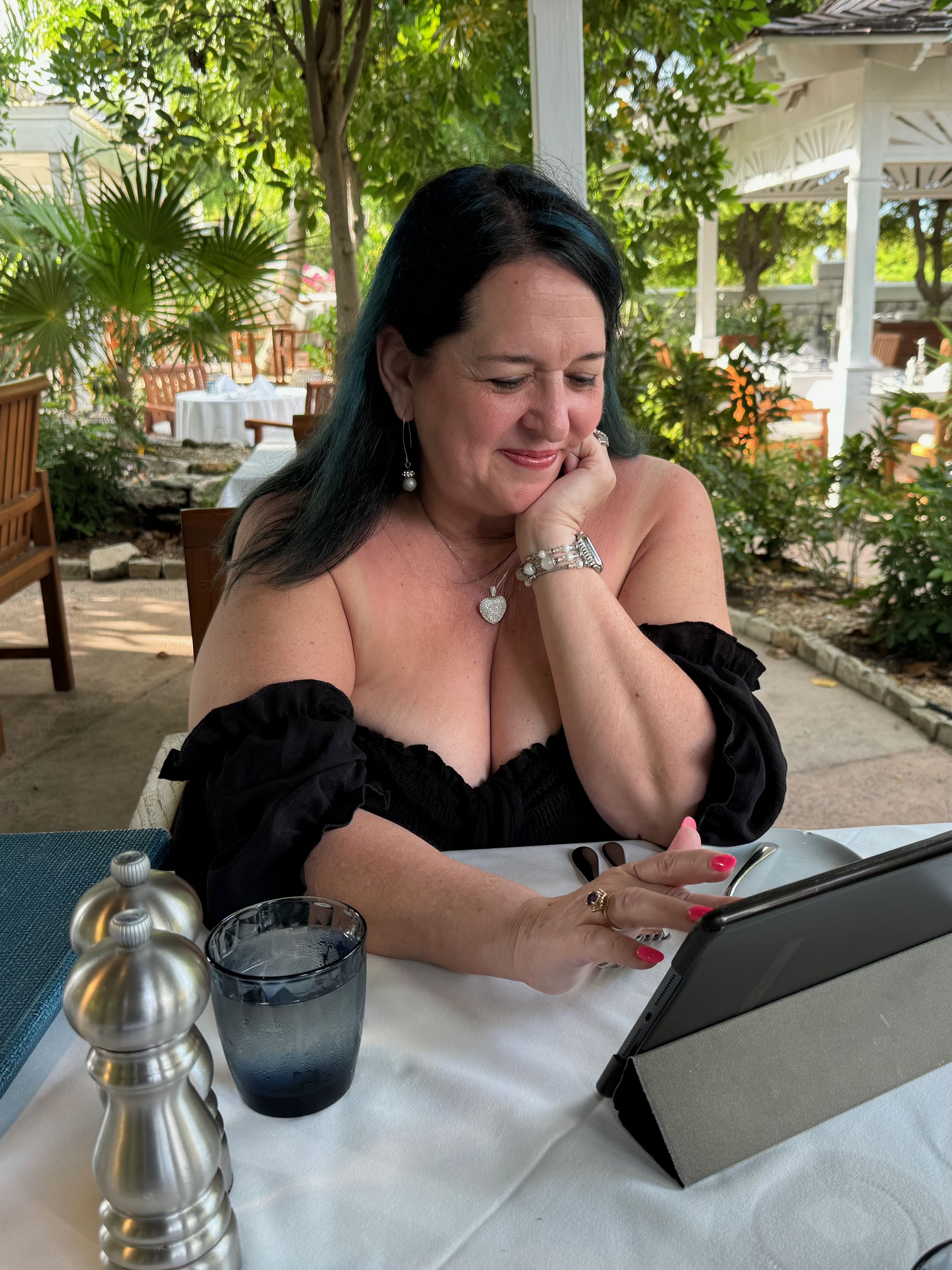 Portrait of someone very special to Steve at an outdoor restaurant.